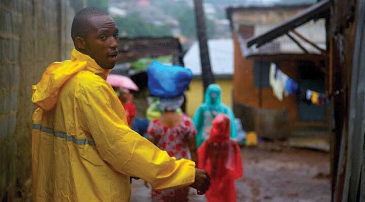 Guinea infection prevention – Community Health Officer Mr. Camara (Photo credit: Patrick Adams, RTI International) 