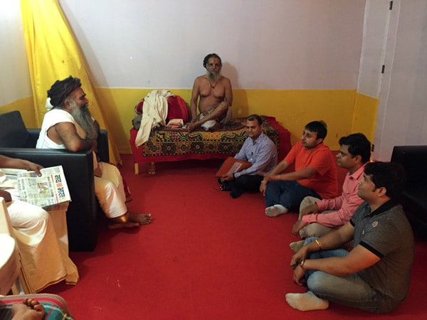 CDC India’s Dr. Rajeev Sharma meets with sadus, or holy men, in preparation for the Nasik Kumbh Mela.