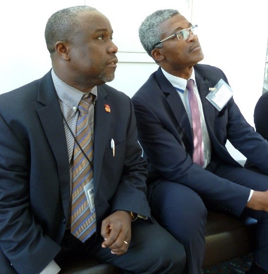 Dr. Omer Pasi, DGHP Country Director in Cameroon, and Cameroon Ministry of Health official Dr. Georges Alain Mballa Etoundi at the CDC GHSA/Ebola Grantee Meeting, February 2016.