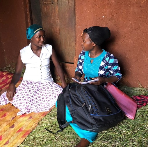 Health worker meets with community member. Photo Credit: ICAP