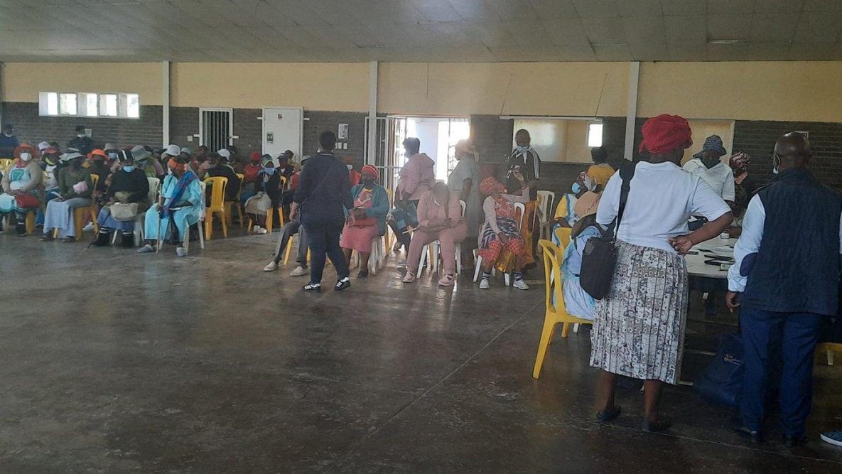 Photo of people waiting in line for a COVID-19 vaccine in March 2022 at Lady Grey Community Hall.
