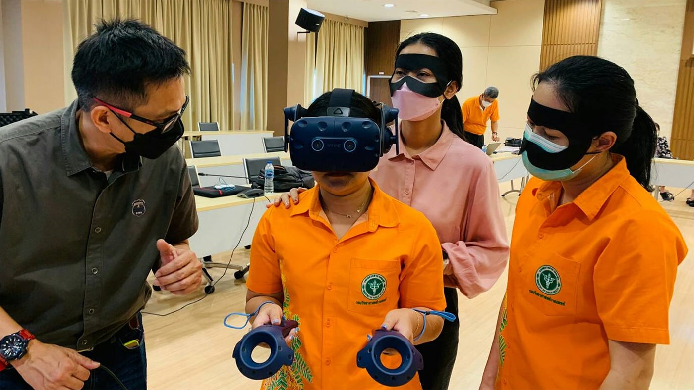 Staff at CDC Thailand participate in Virtual Reality (VR) Biosafety Cabinet (BSC) training modules.