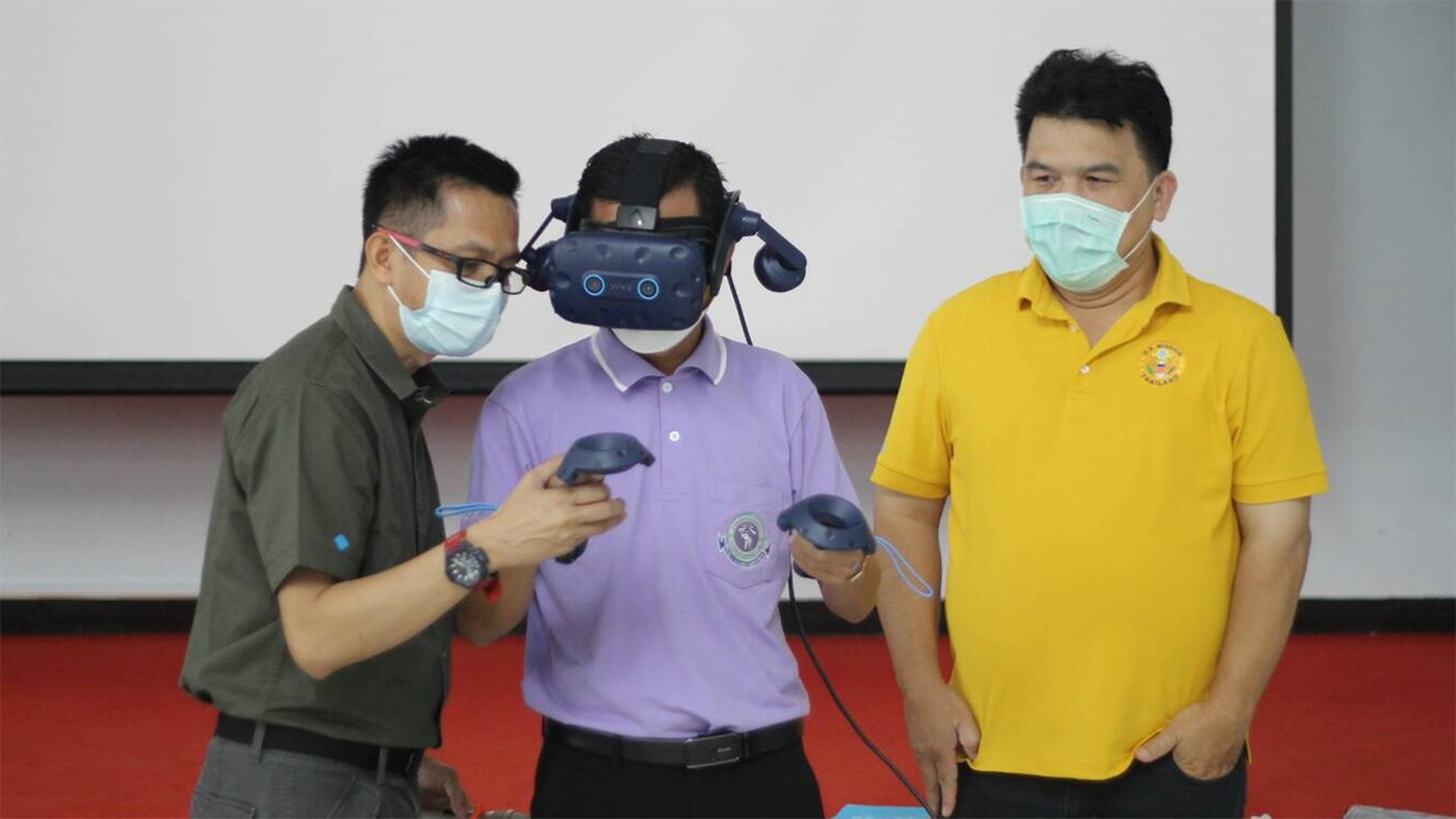 Staff at CDC Thailand participate in Virtual Reality (VR) Biosafety Cabinet (BSC) training modules.