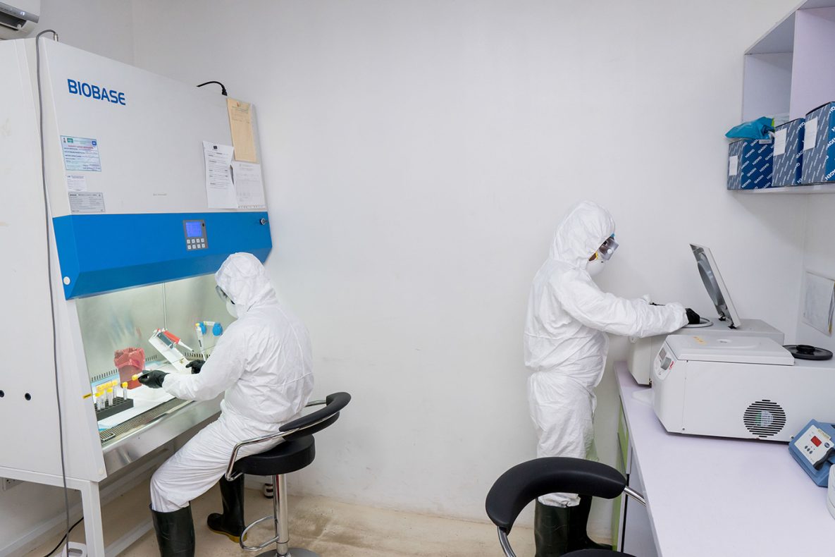 Photo of public health workers processing COVID-19 samples at the Central Public Health Lab in Lagos, Nigeria.