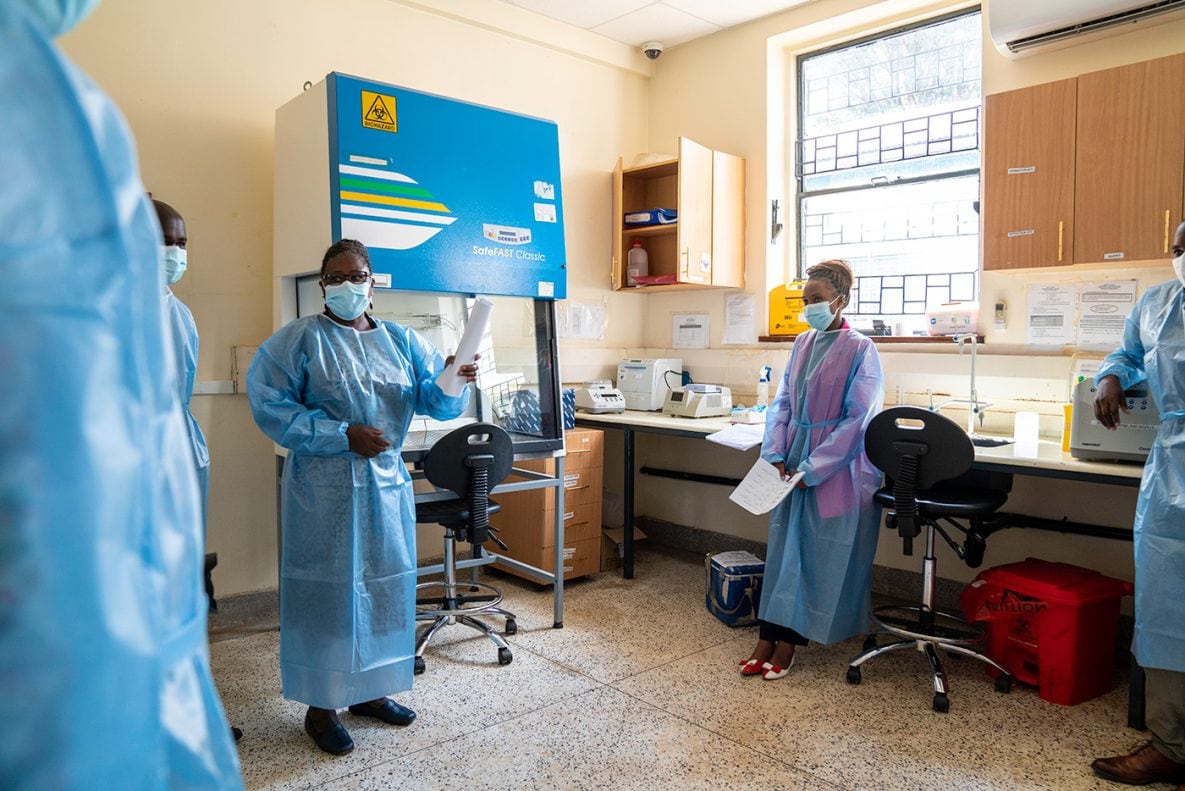 Photo of several people working in Kenya’s National Influenza Center Laboratory.