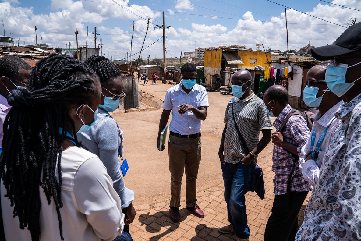 Photo of a disease surveillance team working in a community.