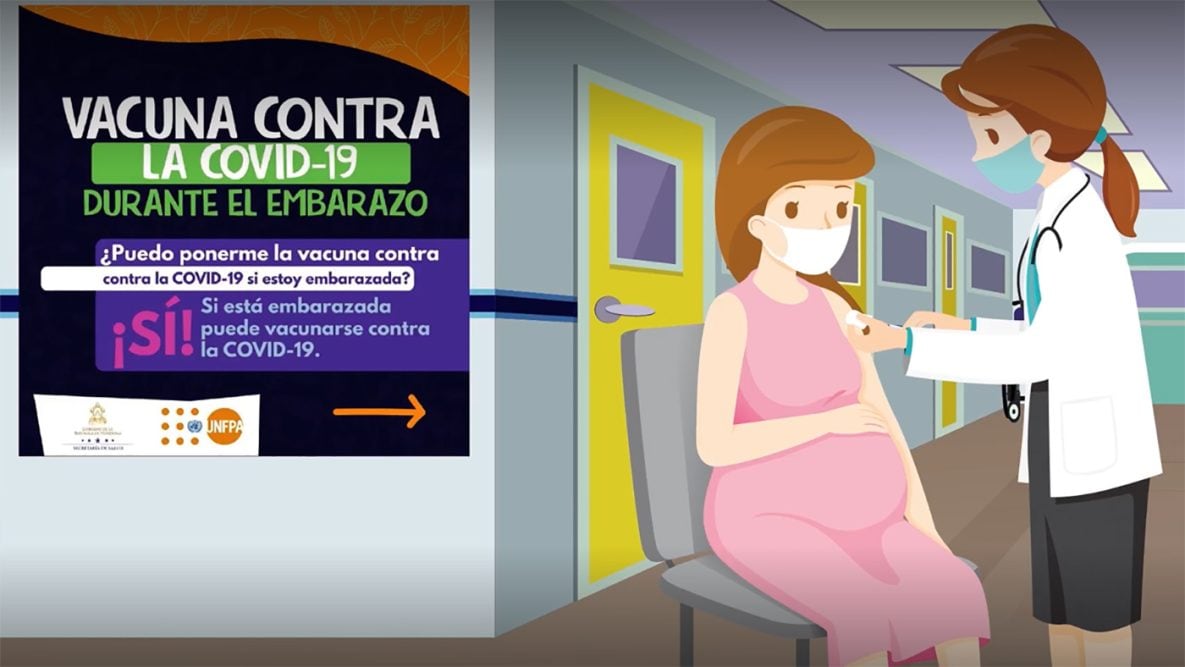 A poster shows a drawing of a pregnant woman getting counseled about COVID-19 vaccines.