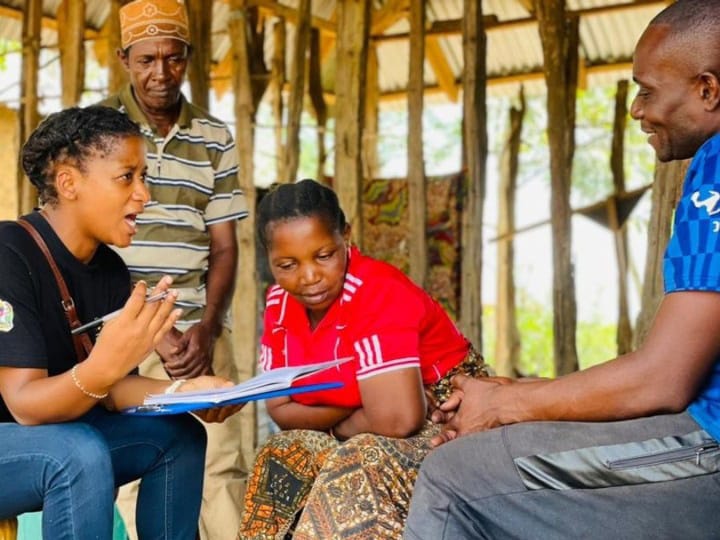 Community mobilizer conducts interviews during the data collection activities in Tanzania.