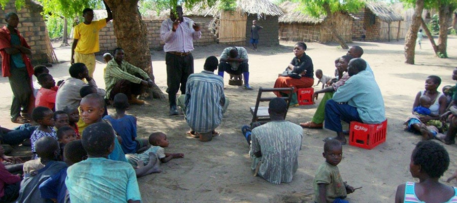 FETP resident lecturing to a group of villagers on the topic of cholera in response to an outbreak in the region