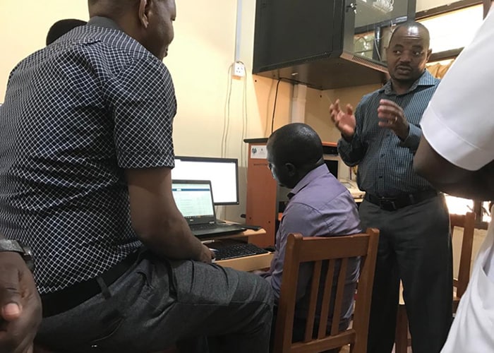 Dr. Kazitanga conducting a site assessment