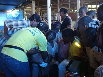 vaccinator giving the measles-rubella shot