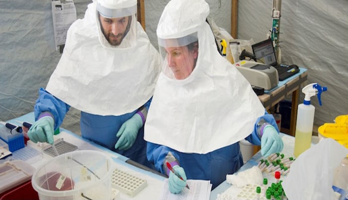 Laboratorian wearing PPE
