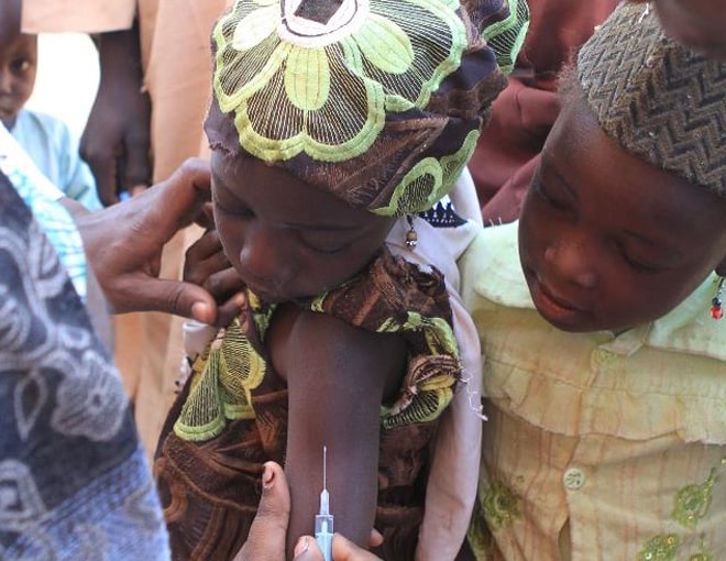 Photo: Children receiving vaccination