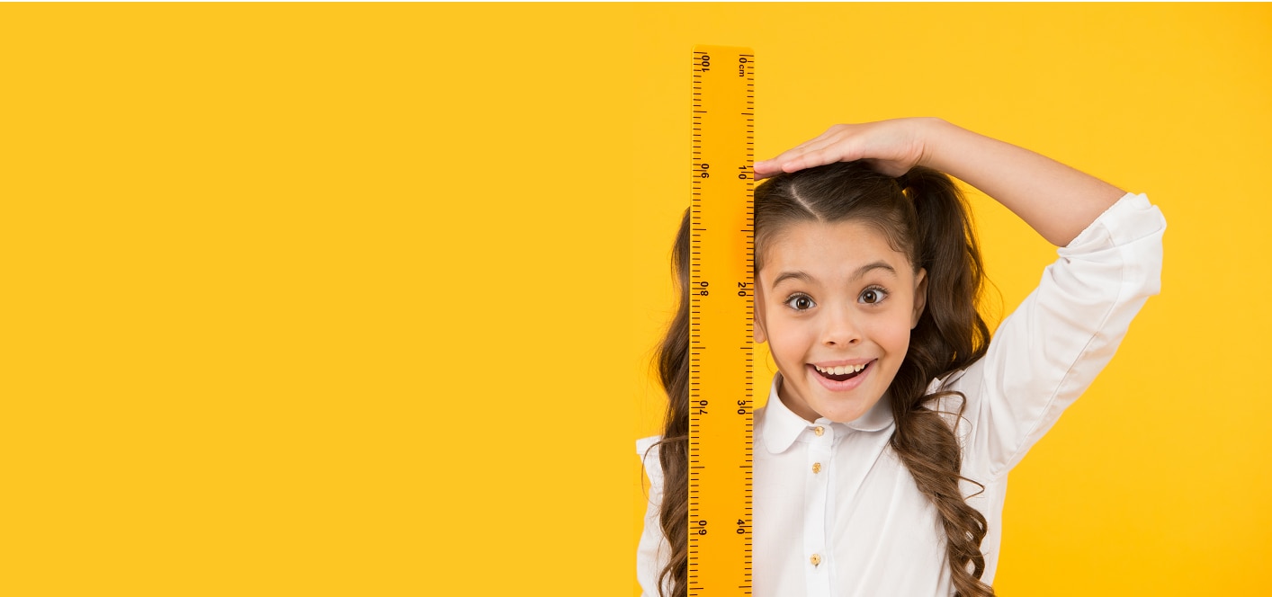 girls with measuring stick