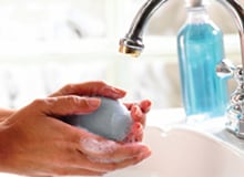 Photo of person washing hands