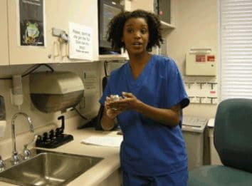 nurse washing her hands from the hand hygiene video