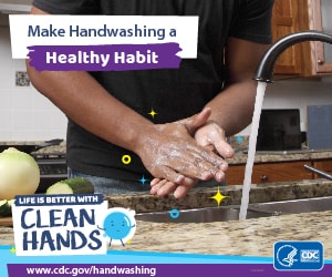 Close-up of a man washing his hands in a kitchen and a reminder to make handwashing a healthy habit.