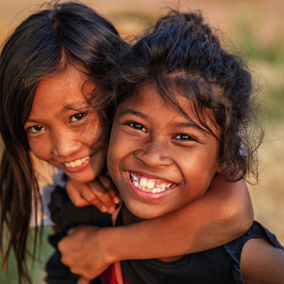 two smiling Cambodian girls