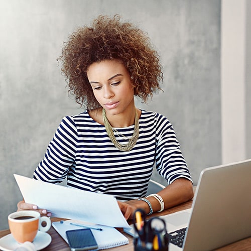 Woman reading Plain Writing Act Compliance Report