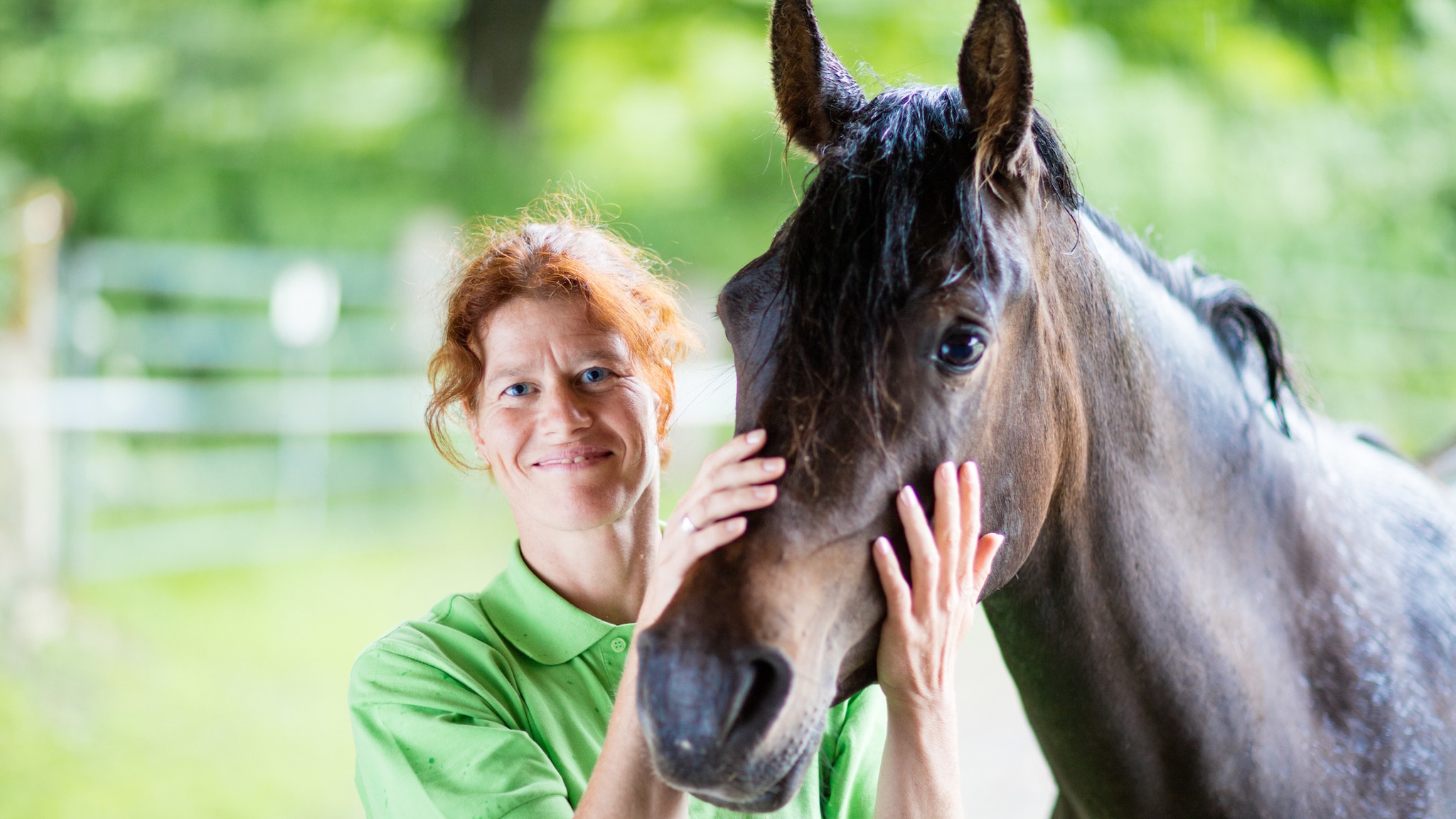 A female veterinarian with a horse