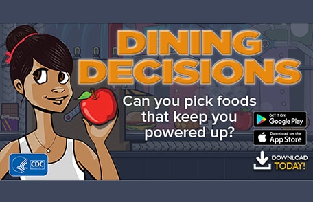 Kendra, the Dining Decisions character, holds a red apple in her hand. 