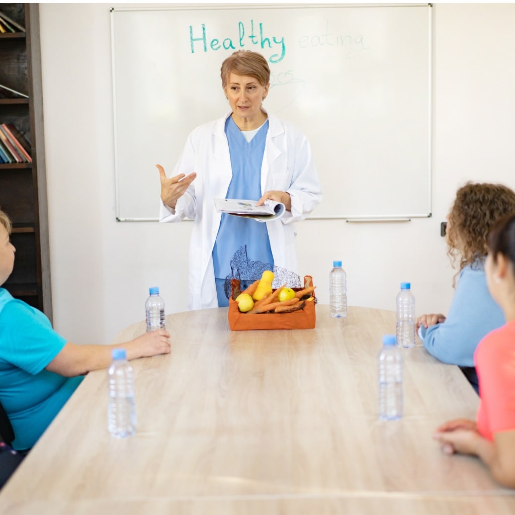 School nurse teaching about healthy eating and exercise.