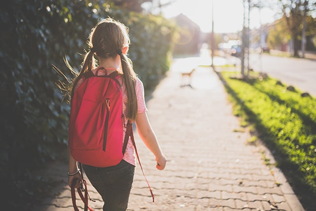 Girl walking to school