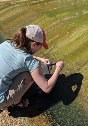 Woman testing soil