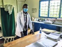A clinician at a healthcare facility in Kisumu County, Kenya