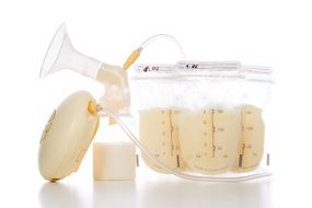 Breast milk pump with bottle