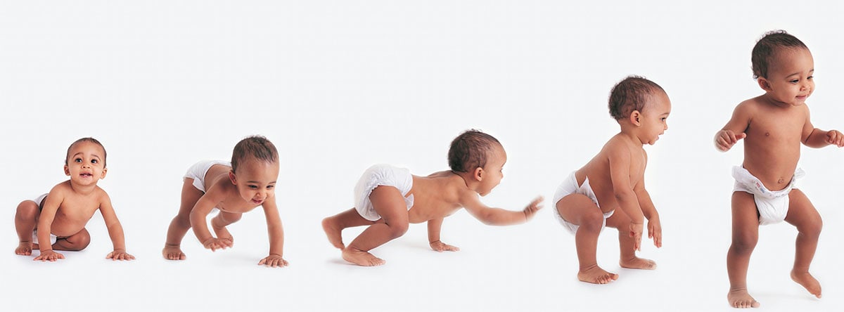Sequence Showing a Baby in a Nappy Learning to Walk