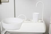 Photo of dental wash basin with faucet