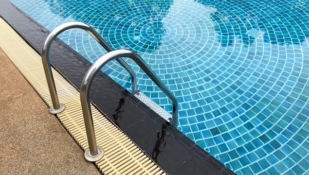 Ladder going into a pool
