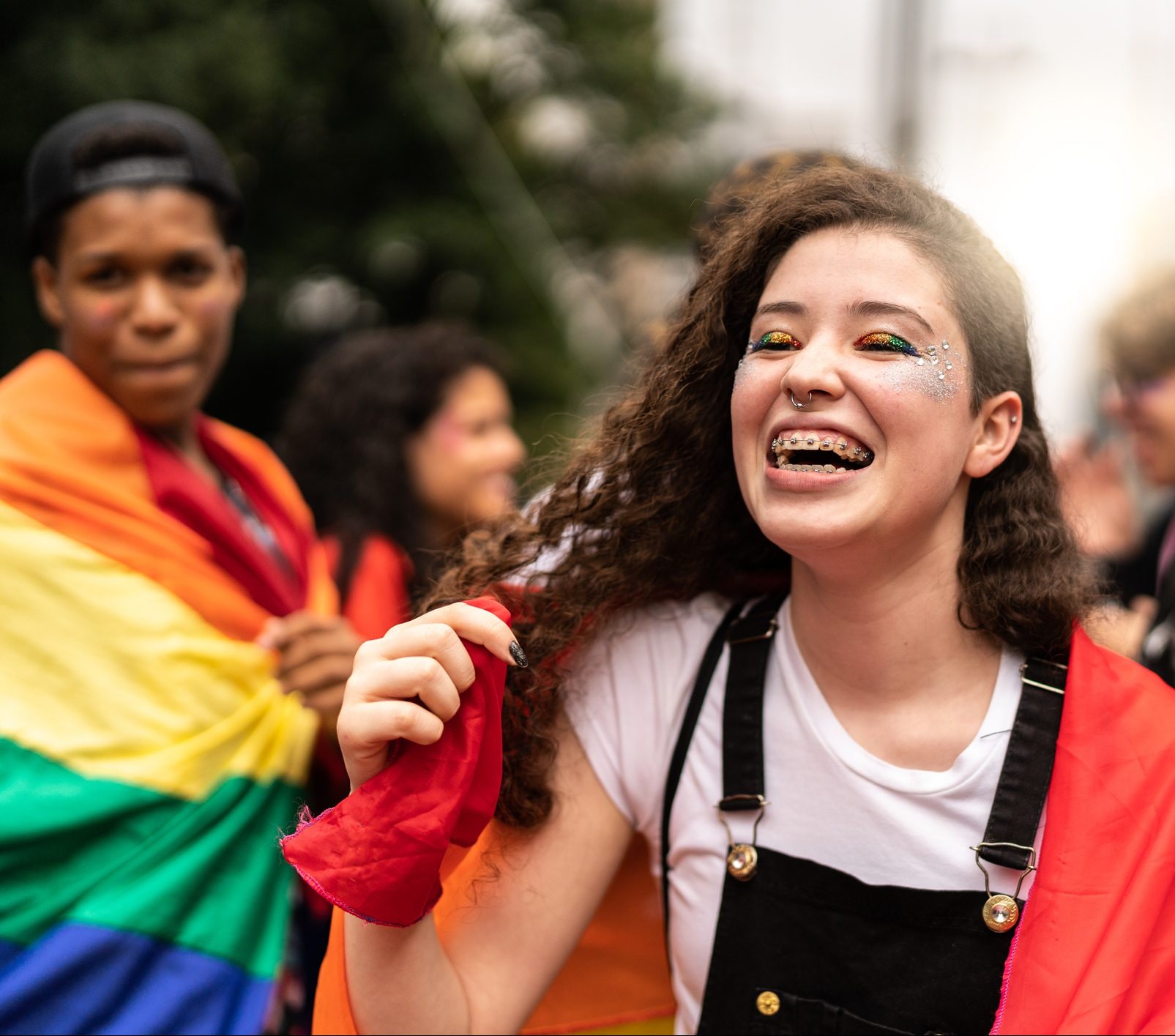 Portrait of smiling Lesbian Young Woman on a LGBTQ parade