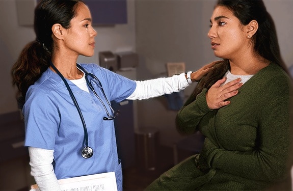 doctor talking to woman