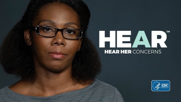 Black woman with Hear Her campaign logo.