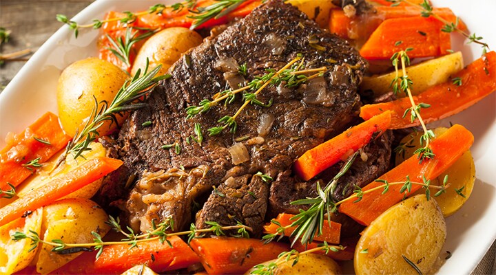 cooked pot roast with potatoes and carrots