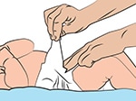 fastening diaper on child