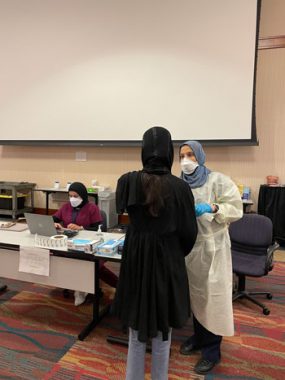 An Afghan guest being tested for COVID-19 at the National Conference Center (Leesburg, VA) safe haven site