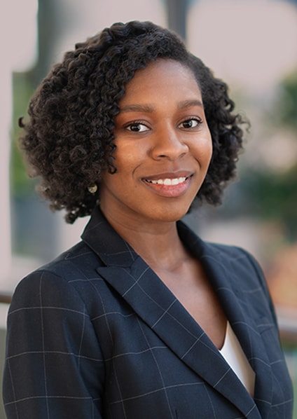 Head shot of Victoria Phifer, professional black woman with short black curly hair