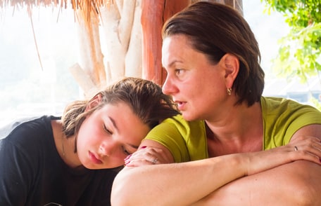 Image describing rural suicide showing a conversation between a mother and daughter