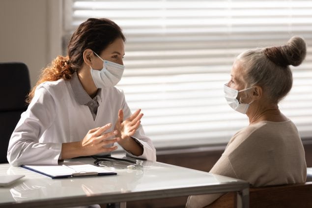 doctor speaking with a patient
