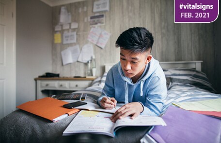Image with Vital Signs logo showing a teen reviewing for exams