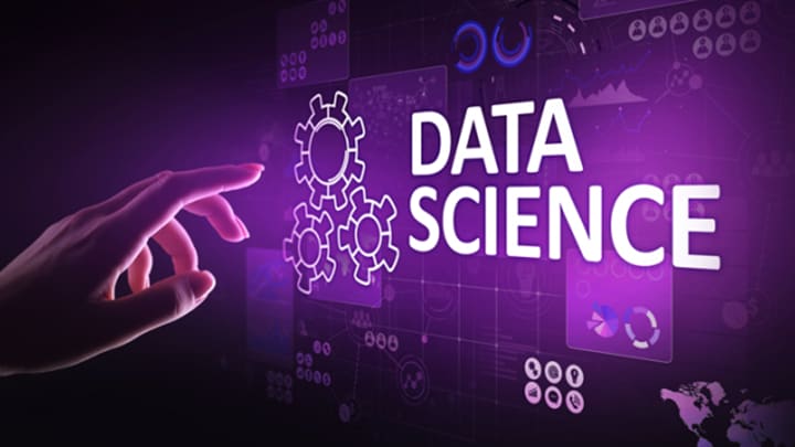 Hand reaching towards a data science screen