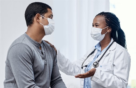 Image of a patient and doctor in conversation
