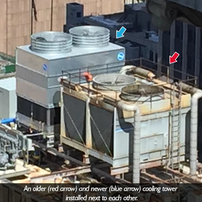 A picture of older and newer cooling towers installed next to each other.