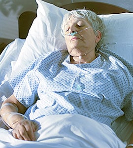 Elderly woman sick in bed