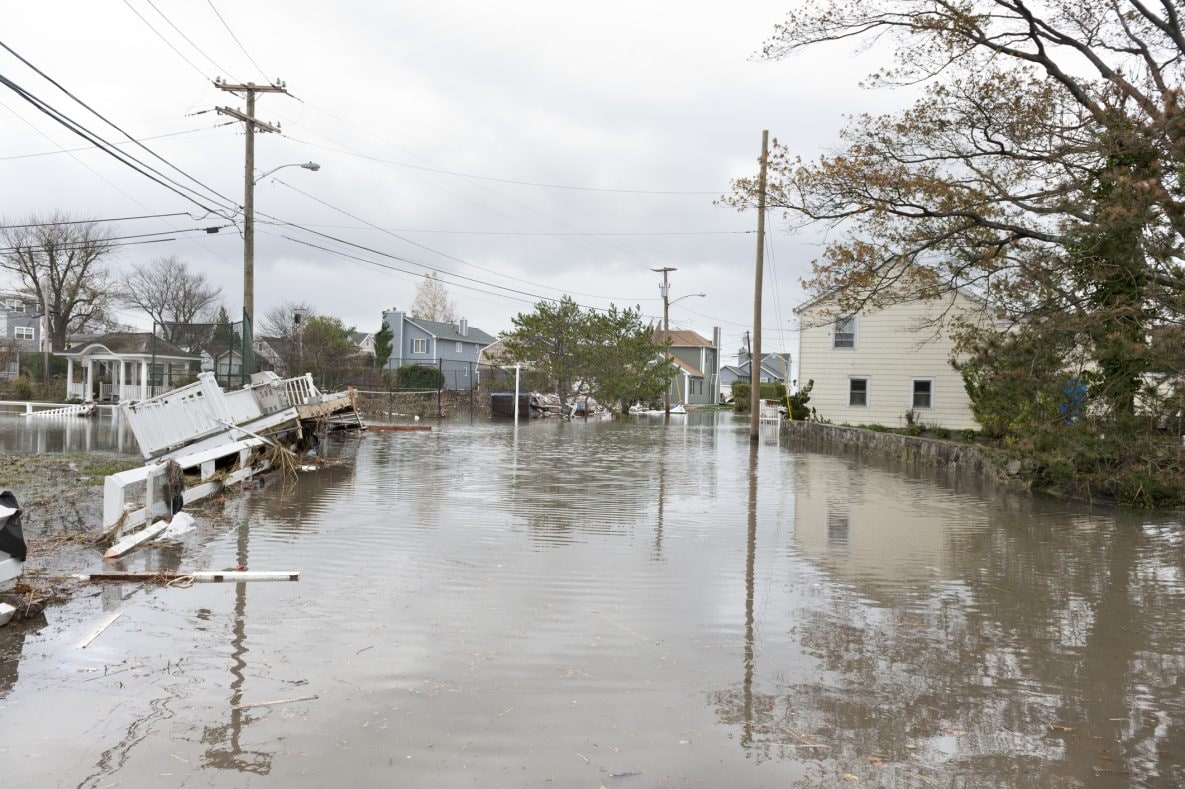 Damaged houses and flooded streets after Hurricane Sandy