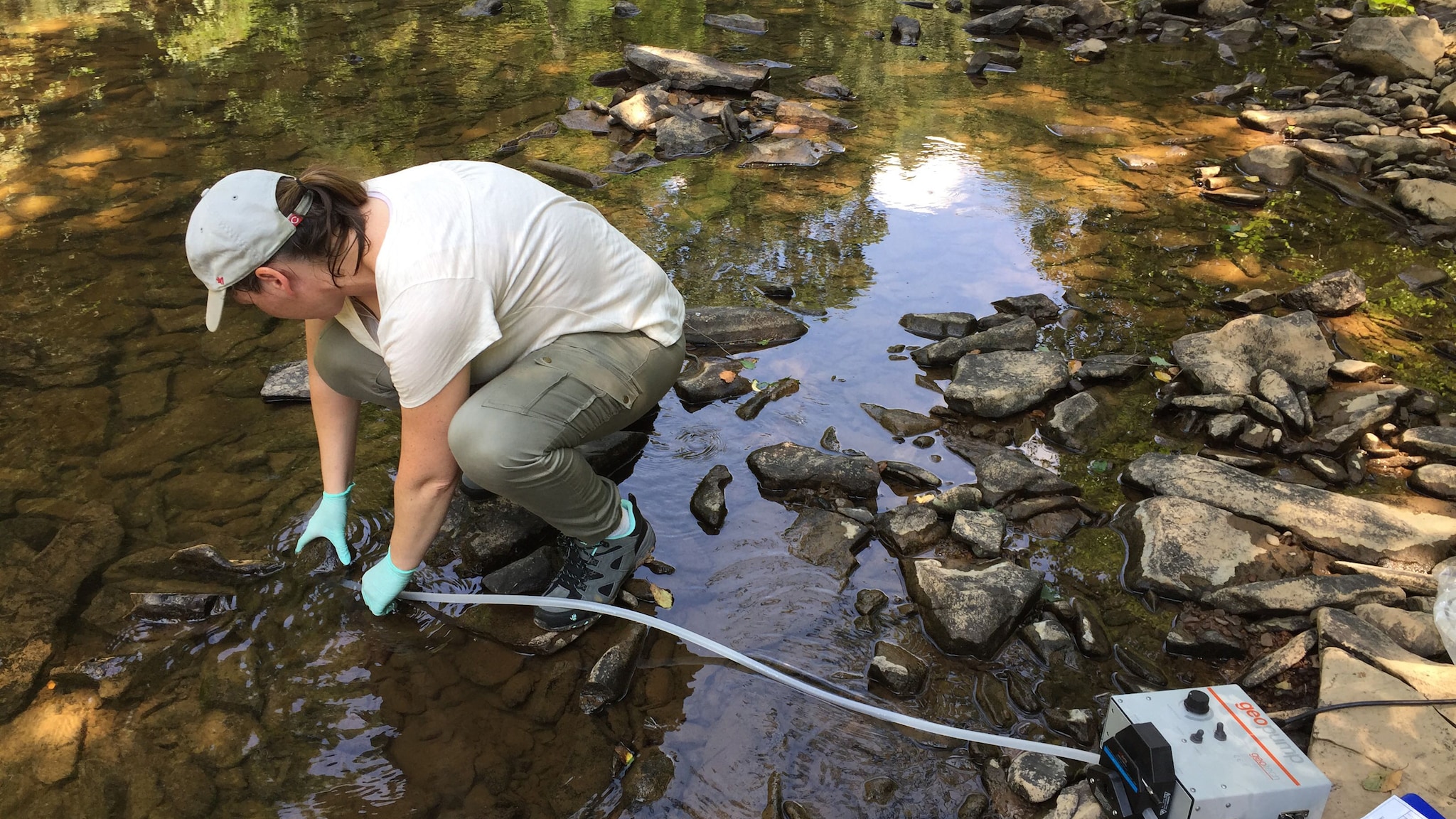 LLS fellow conducts water sampling during Epi-Aid investigation.