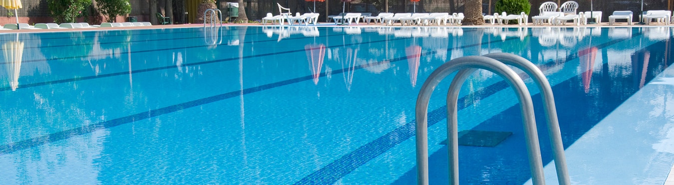 A large swimming pool on a sunny day